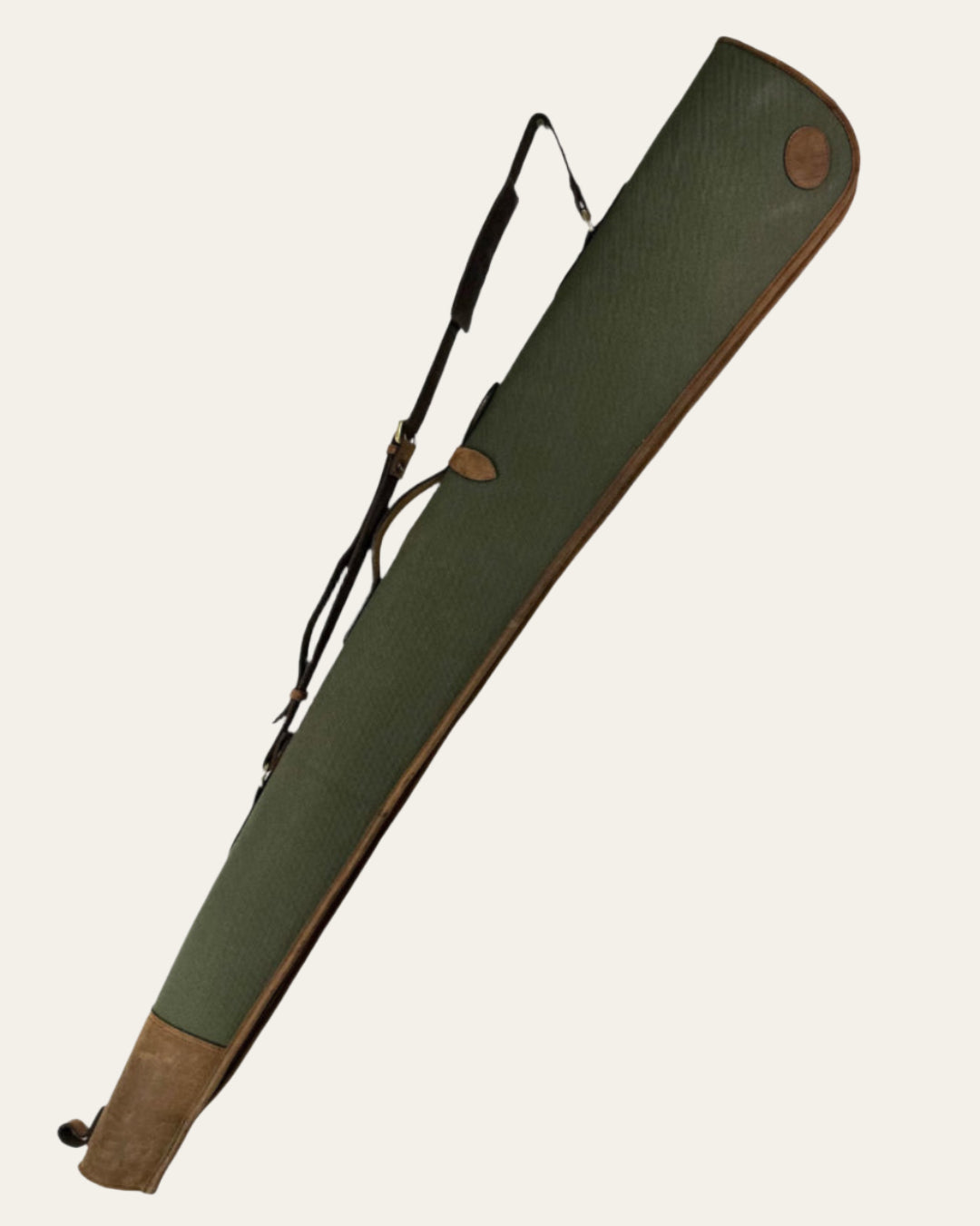 Handcrafted canvas and leather zip-around shotgun slip with full-zip closure for easy access