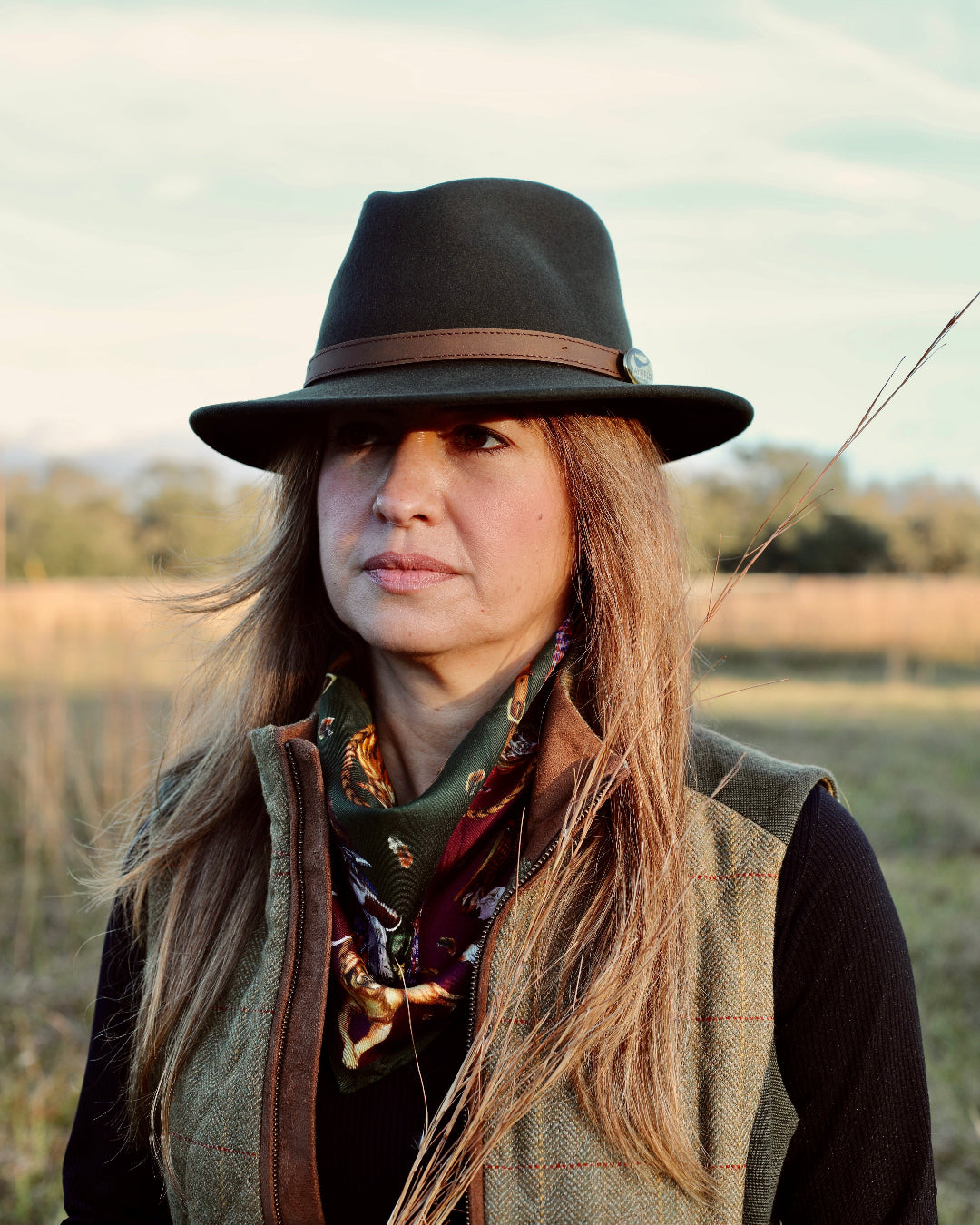 Hunter green felt fedora with tan leather band by Hayfield England