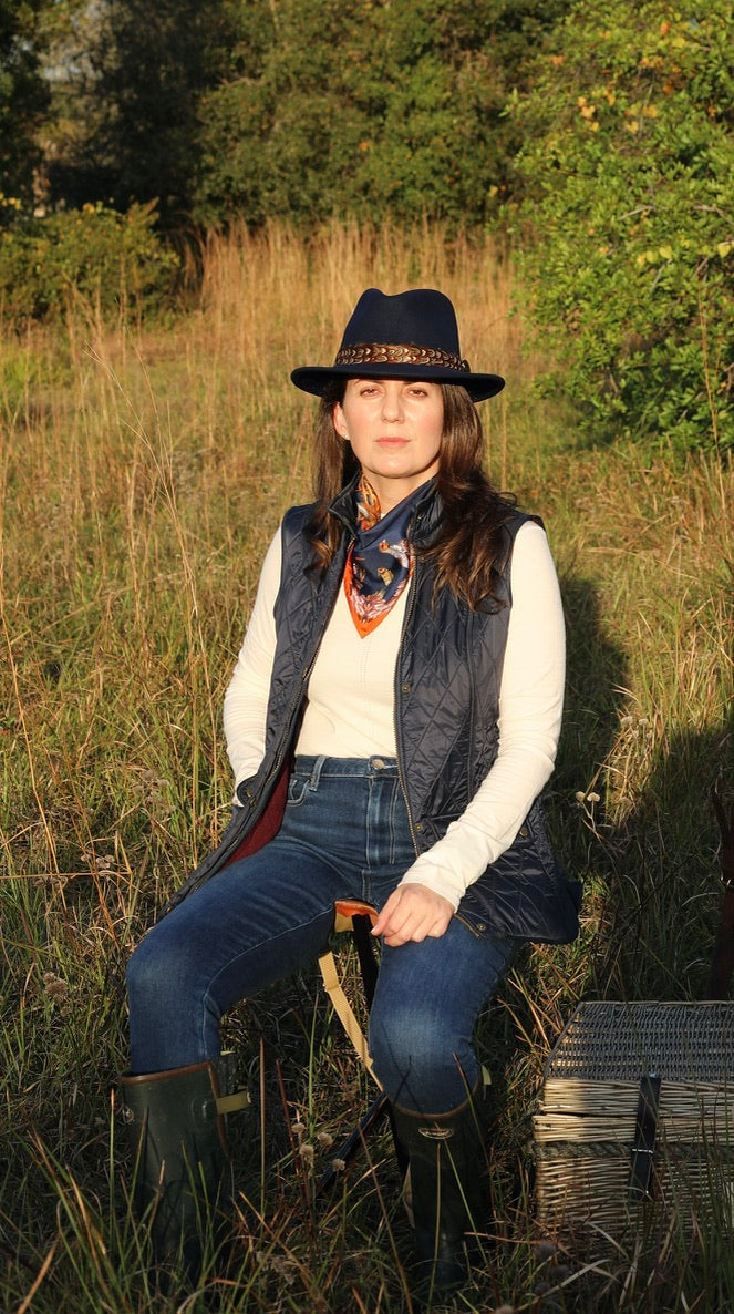 Navy blue felt fedora with pheasant feather wrap by Hayfield England