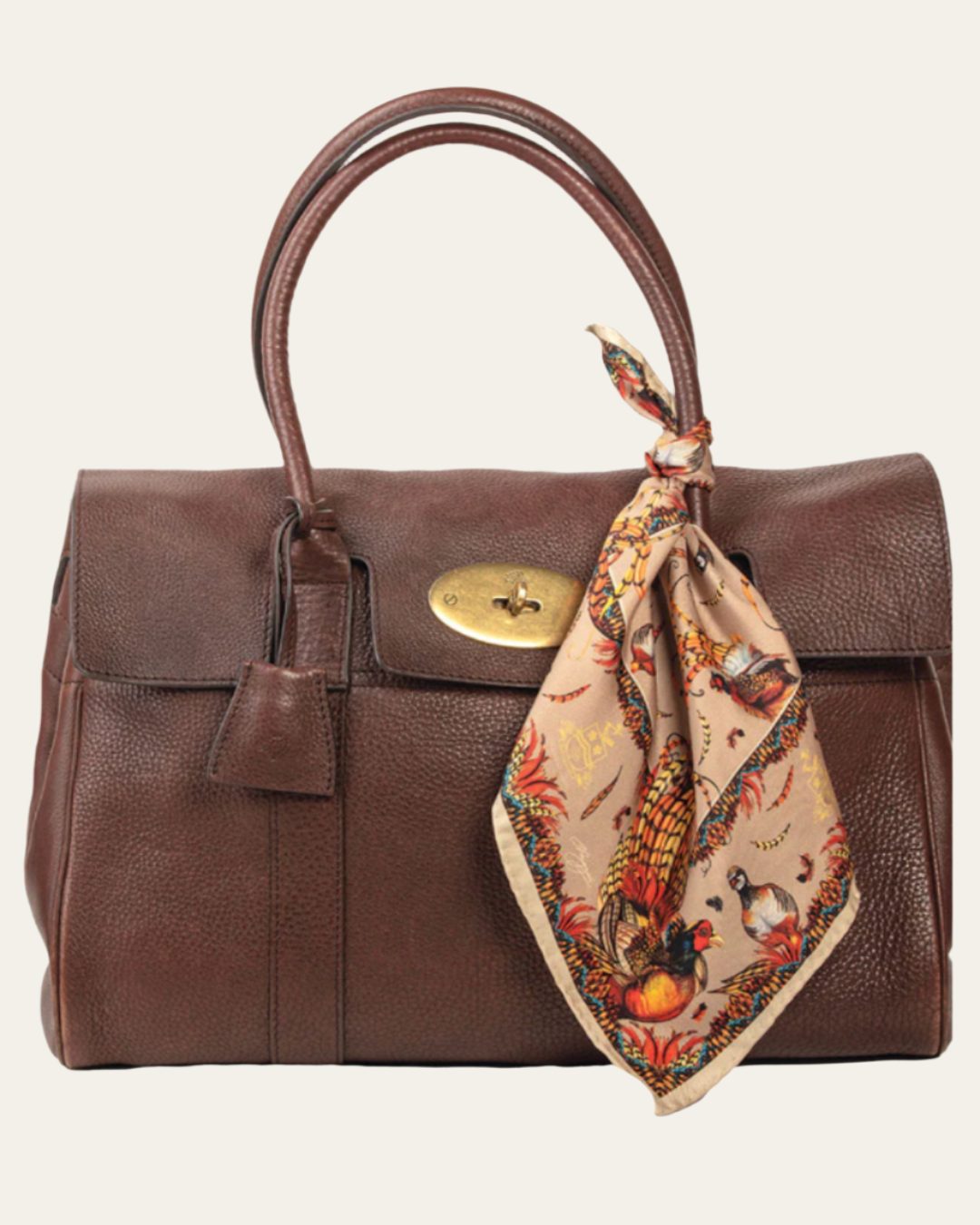 Luxury silk scarf by Clare Haggas with game bird illustrations, perfect for versatile styling