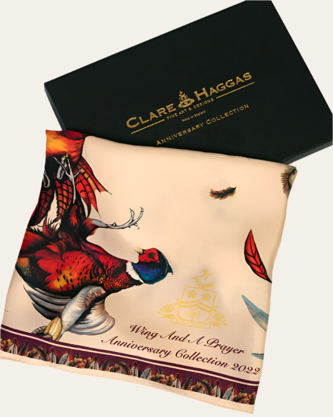 Elegant British-made silk scarf with hand-drawn bird artwork by Clare Haggas