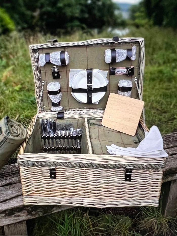 Luxury 4-person green tartan picnic hamper with rope handles, leather fittings, and cooler pouch