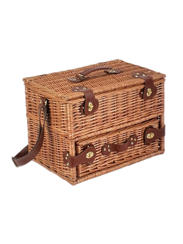 Elegant picnic hamper with green tartan lining, leather fasteners, and dedicated wine drawer"