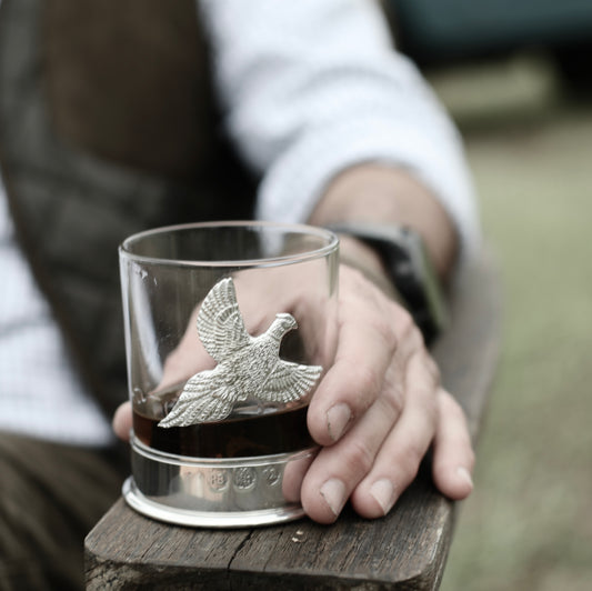 Flying Pheasant whisky glass with English pewter ring and heavyweight glass