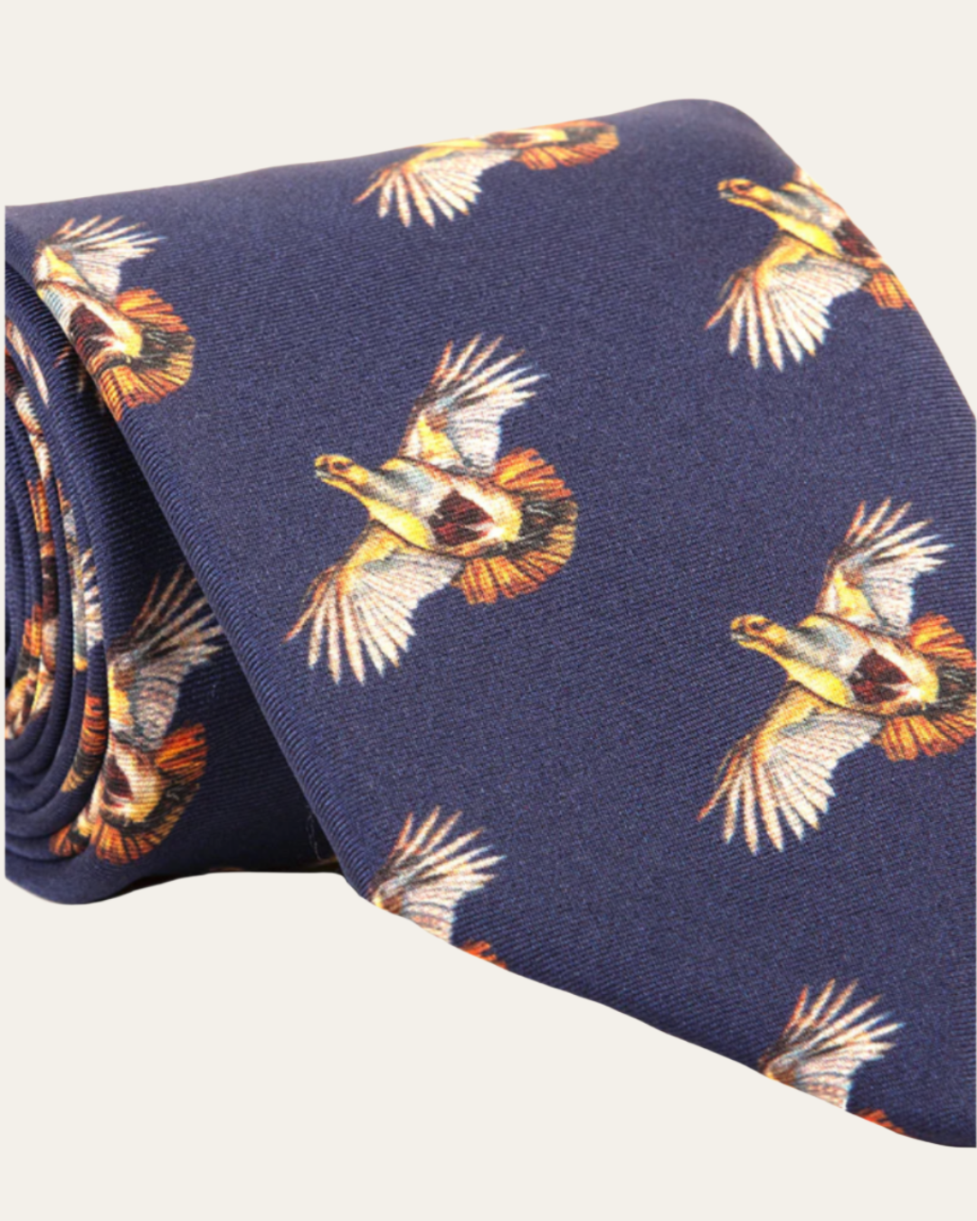 Luxury navy silk tie with partridge artwork, hand-finished by Clare Haggas, limited edition