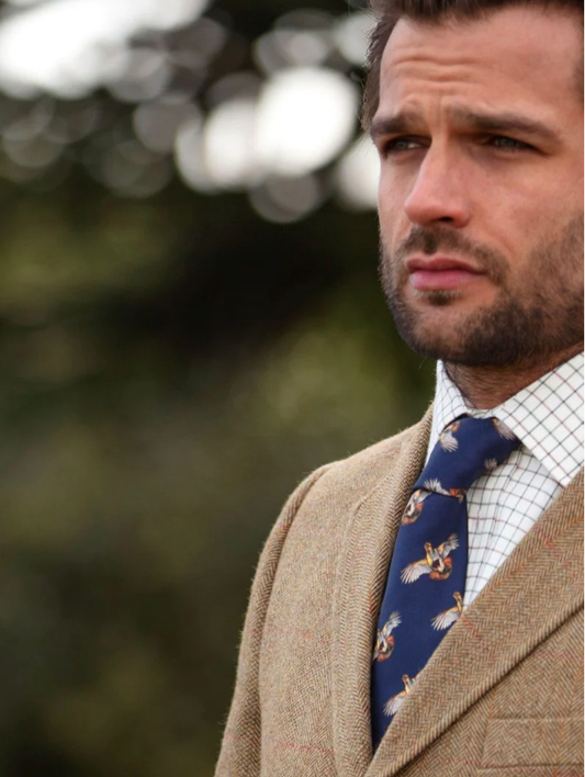 High Flyer navy silk tie featuring English partridge design by Clare Haggas, limited edition