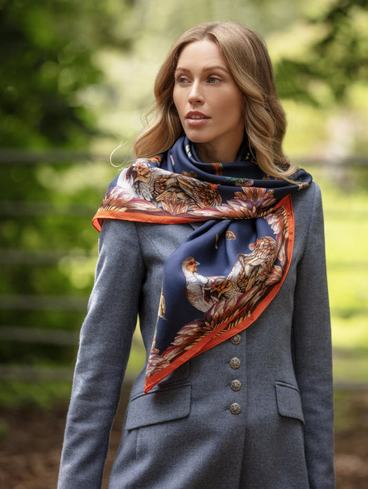 Clare Haggas Grouse Misconduct large silk scarf in navy and Seville orange with red grouse artwork, 100cm x 100cm